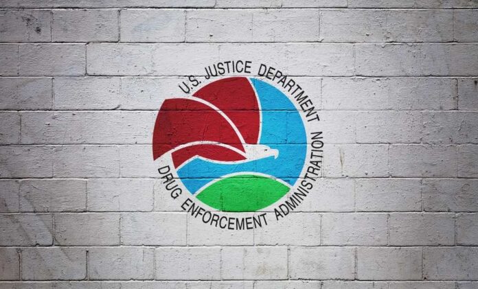 The,Dea,Flag,(drug,Enforcement,Administration),Painted,On,A,Brick