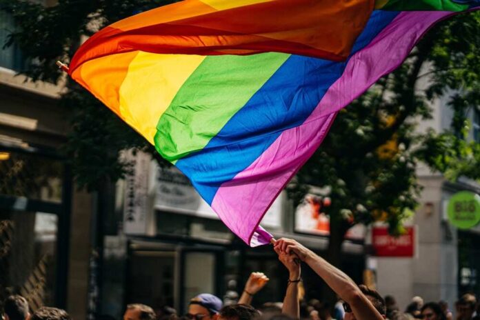 Gay,Pride,,Lgbtq,Rainbow,Flag,With,Clors,Waving,Flags,In