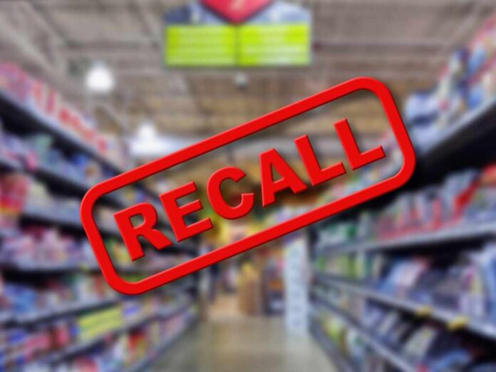 Blurry,Interior,Of,A,Grocery,Store,Aisle,Behind,Large,Red
