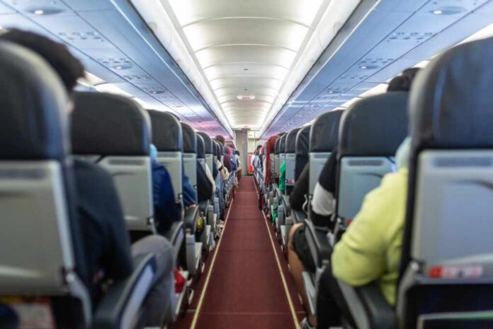Passengers,Traveling,By,A,Plane,,Shot,From,The,Inside,Of