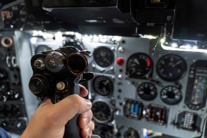 Helm,Of,A,Military,Helicopter,In,The,Pilot's,Hand.,Fighter