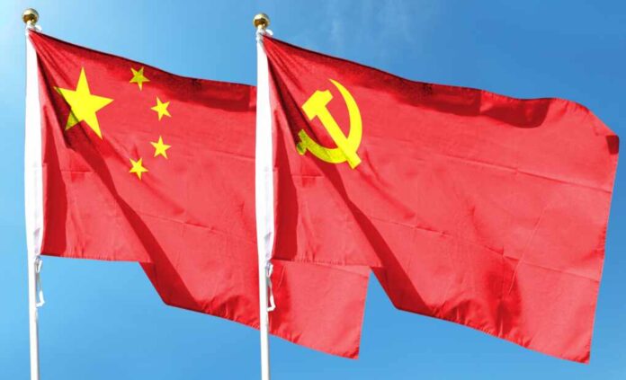 Chinese,Flag,With,Chinese,Communist,Party,Flag,On,Cloudy,Sky.