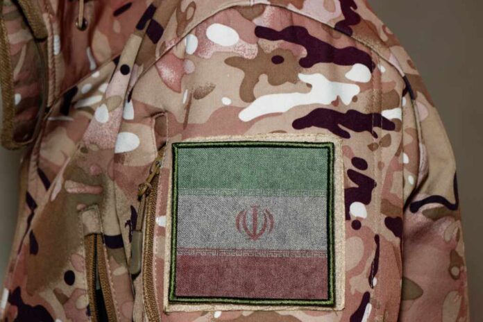 Iran,Soldier.,Soldier,With,Flag,Iran,,Iran,Flag,On,A