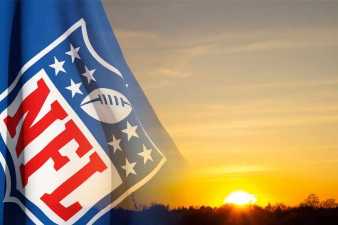 The,Flag,With,The,Nfl,Logo,On,Background,Of,Sky.
