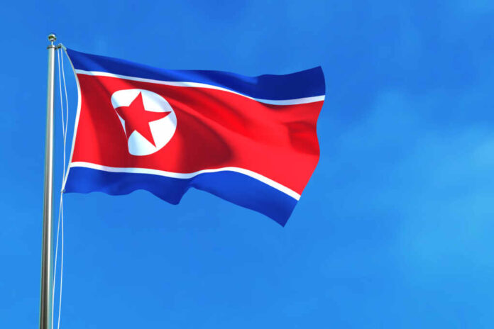 North,Korea,Flag,On,The,Blue,Sky,Background.,3d,Illustration