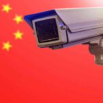 Surveillance camera in front of the Chinese flag