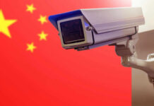 Surveillance camera in front of the Chinese flag
