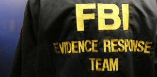Close-up of an FBI Evidence Response Team jacket with gold lettering