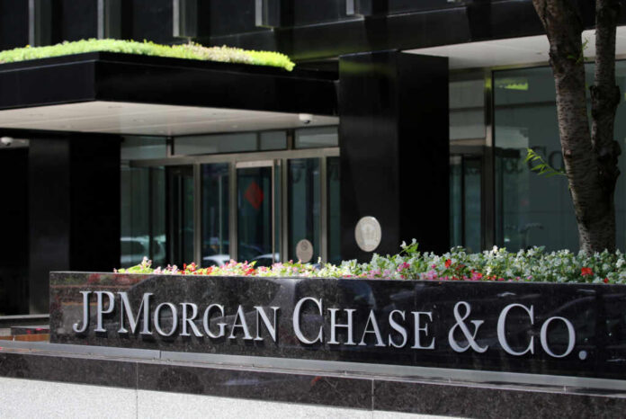 Exterior view of JP Morgan Chase & Co. building with landscaped entrance