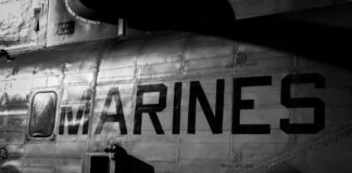 Close-up of a military helicopter with MARINES written on the side