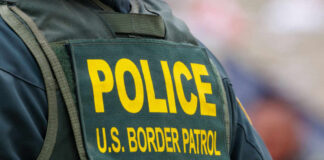 Close-up of a police officers uniform with U.S. Border Patrol insignia