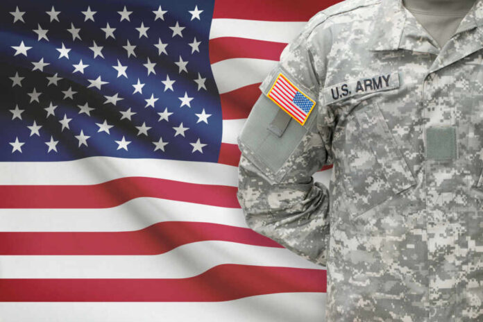 U.S. Army soldiers uniform with American flag in the background