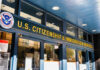 Entrance of the U.S. Citizenship and Immigration Services office with signage