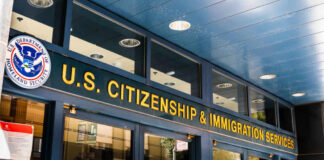 Birthright Citizenship: National Suicide or Necessary Reform? Entrance of the U.S. Citizenship and Immigration Services office with signage