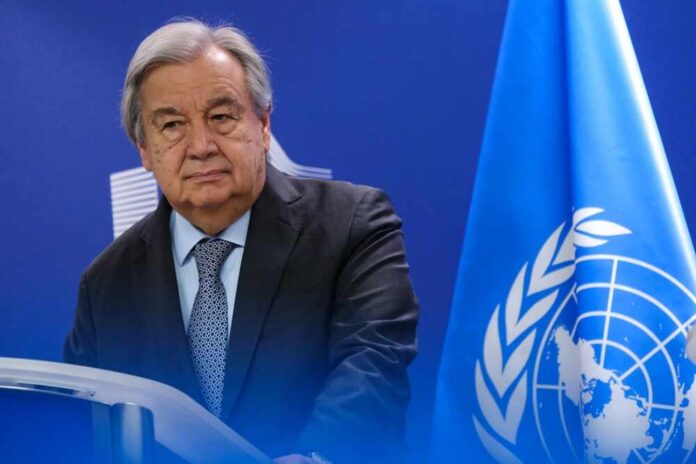 UN Secretary-General standing at a podium during a press conference