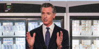 California governor speaking at a press conference about insulin pricing