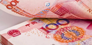 Close-up of Chinese banknotes stacked together