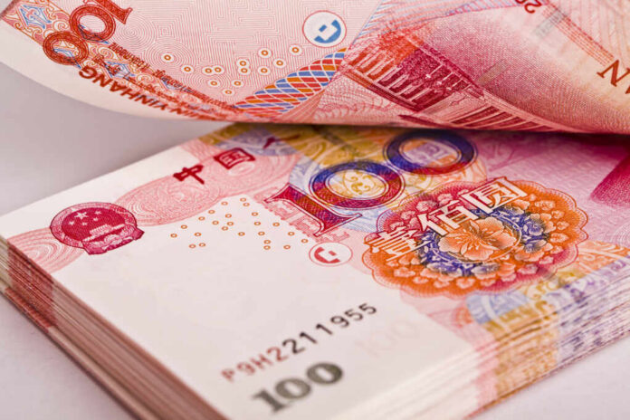Close-up of Chinese banknotes stacked together