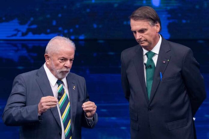 Two Brazilian political leaders engaged in a debate on stage