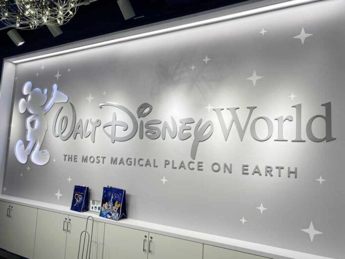 Walt Disney World logo displayed on a wall with decorative elements