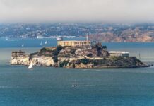 View of Alcatraz Island with sailboats in the foreground