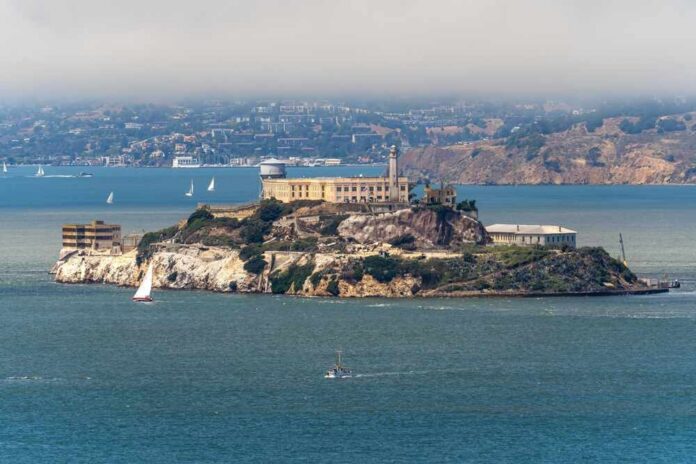 View of Alcatraz Island with sailboats in the foreground