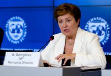 IMF WARNS: Global Economy Faces Long-Term Blow IMF Managing Director speaking at a press conference