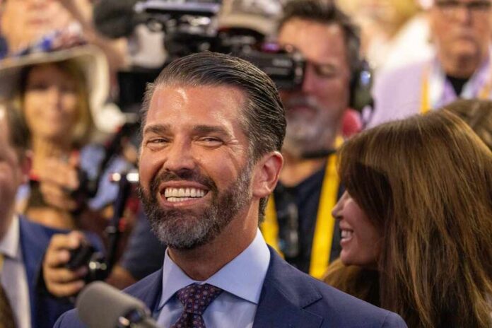 A smiling man in a crowd at an event