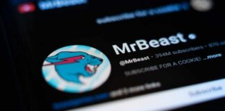 Close-up of MrBeast's YouTube profile on a smartphone screen