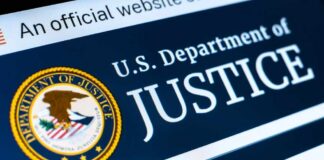 Close-up of the U.S. Department of Justice logo on a website