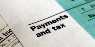 Close-up of a financial document highlighting the Payments and tax section