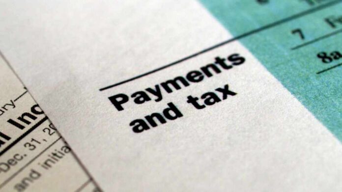 Close-up of a financial document highlighting the Payments and tax section