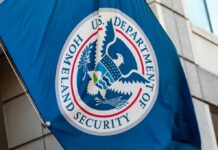 Flag of the U.S. Department of Homeland Security displayed on a building
