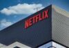 Close-up of the Netflix logo on a modern building