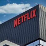Close-up of the Netflix logo on a modern building