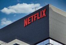 Close-up of the Netflix logo on a modern building