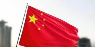 China’s Robo Army Stuns During Trump Visit Waving flag of China with a star and four smaller stars