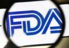 Magnifying glass focusing on the FDA logo