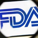 Magnifying glass focusing on the FDA logo
