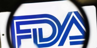 Magnifying glass focusing on the FDA logo
