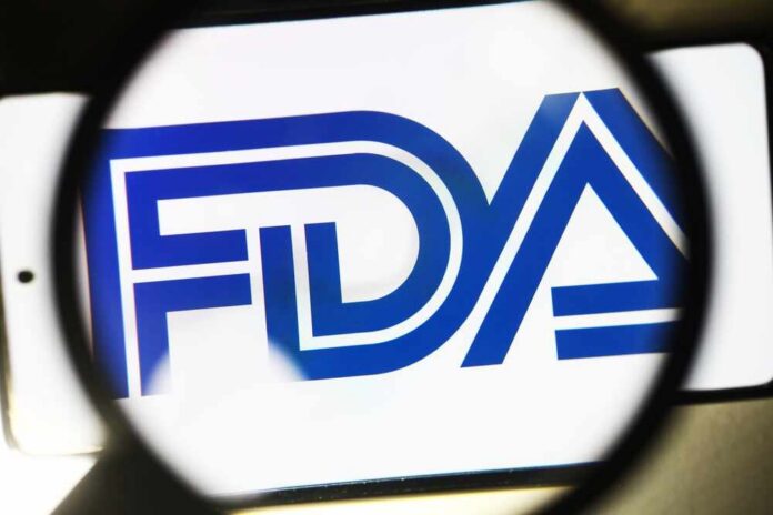 Magnifying glass focusing on the FDA logo