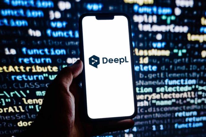 A hand holding a smartphone displaying the DeepL logo against a programming code background