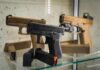 Display of handguns in a glass case