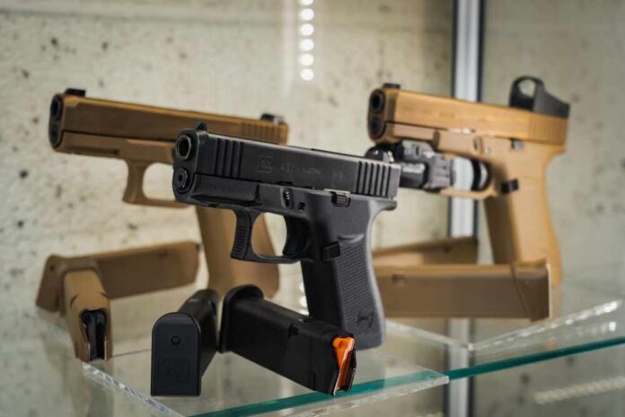 Display of handguns in a glass case