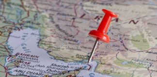 Iran’s ‘Green Fee’ SCAM Exposed — Rubio Vows to Keep Hormuz Open A red pushpin on a map of the Middle East highlighting a specific location