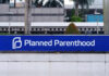 Sign for Planned Parenthood located in an urban area