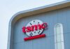 TSMC logo displayed on a modern corporate building