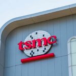 TSMC logo displayed on a modern corporate building