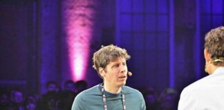 Speaker engaging with an audience at a technology conference