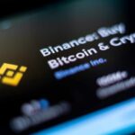 Close-up of the Binance app interface displaying Bitcoin and cryptocurrency options